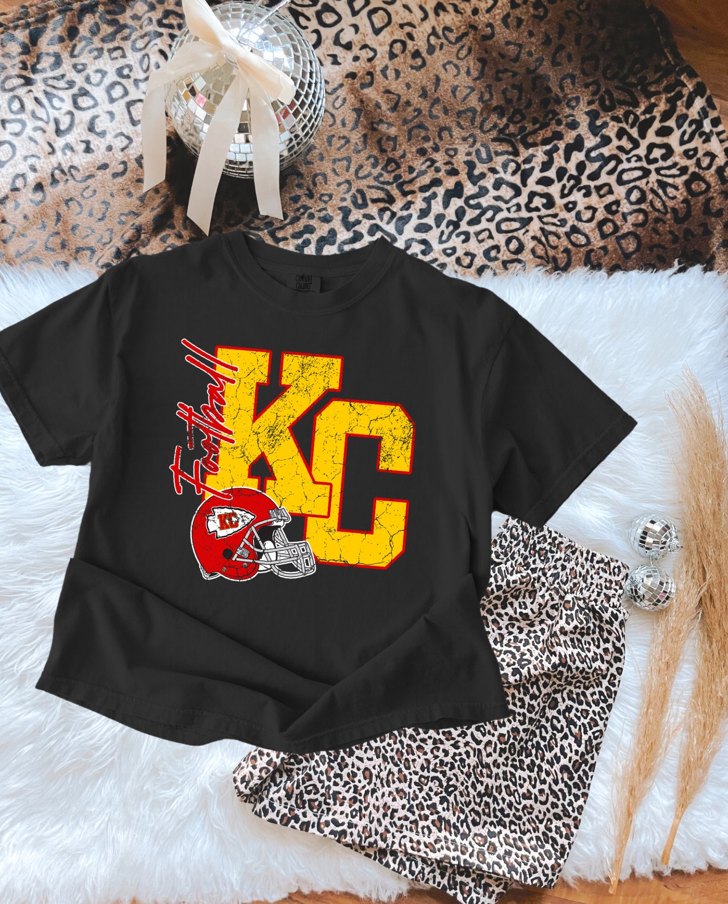 **FIRST 50** Crackeled KC Football Helmet Black Tee