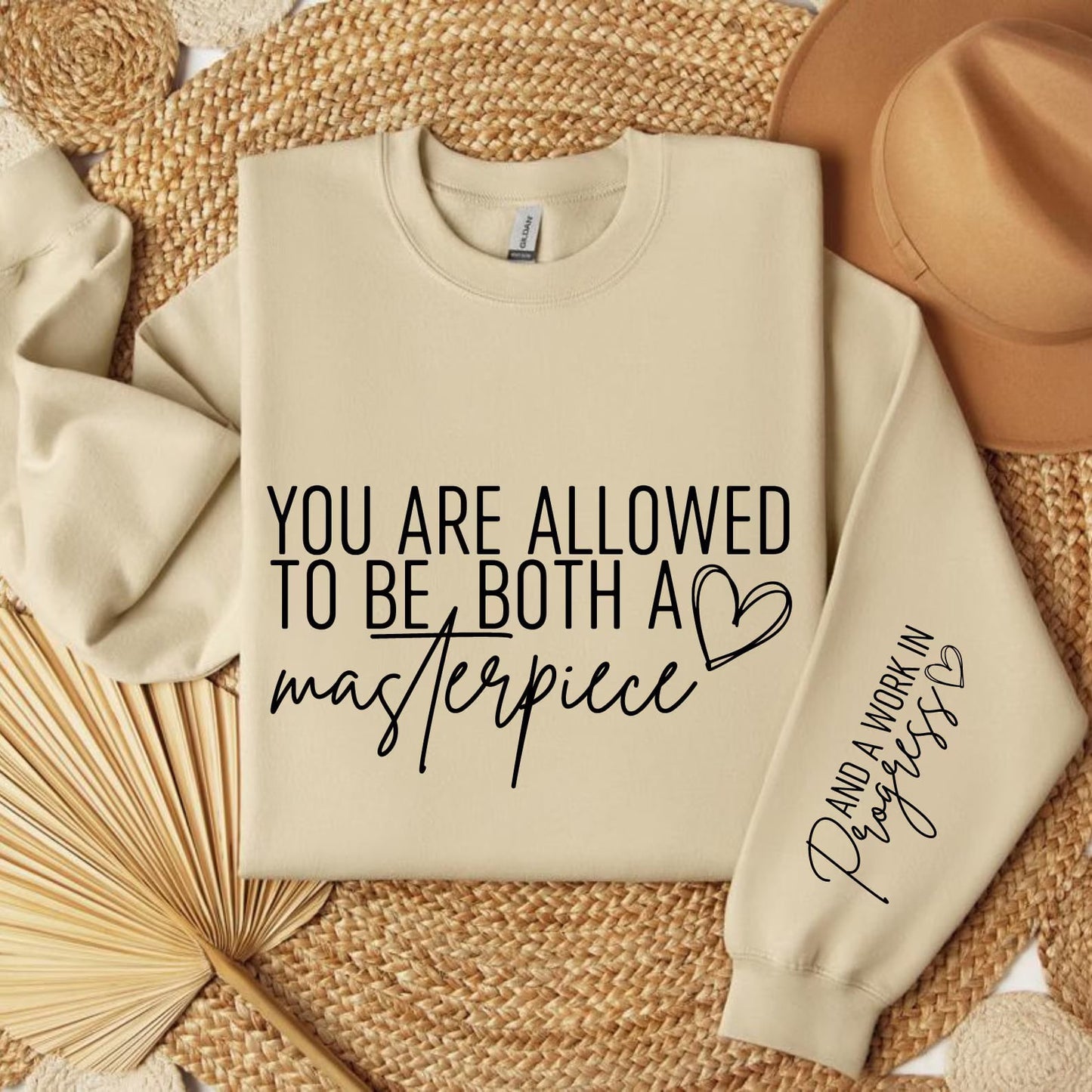 You Are Allowed To Be Both A Masterpiece & A Work In Progress Sleeve Sand Sweatshirt