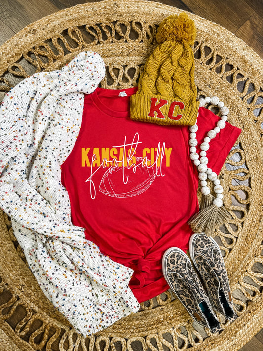 **HALFTIME DEAL** Gold Kansas City White Football Outline Script Red Tee