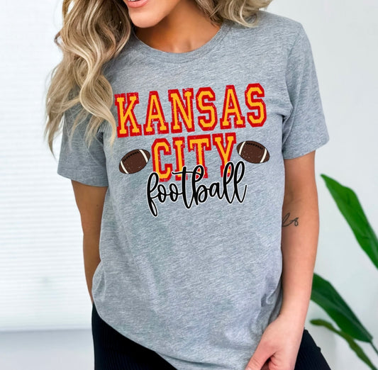 **HALFTIME DEAL** Red & Gold Block Kansas City Football Script Heather Grey Tee