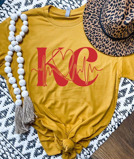**HALFTIME DEAL** Gold KC Football Heartbeat Heather Mustard Tee