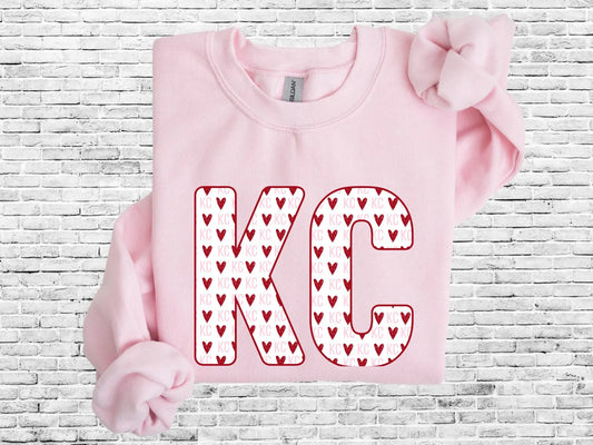 Multiple KC Hearts Inside KC Light Pink Sweatshirt